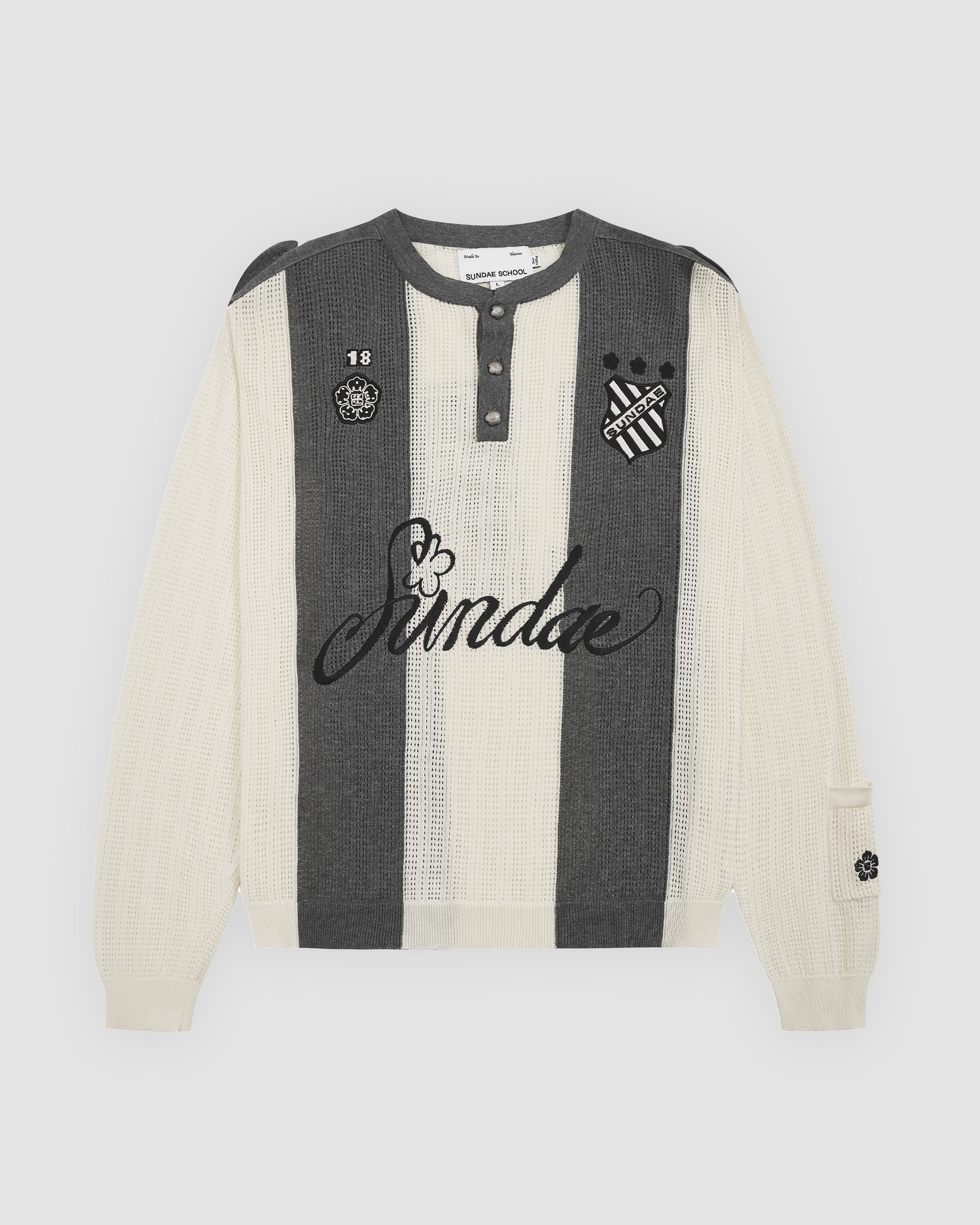 Butter Yellow Charcoal Sundae Soccer Jersey Knit flat lay featuring vertical striped ribbed knit construction, henley-style button placket with grey snap buttons,