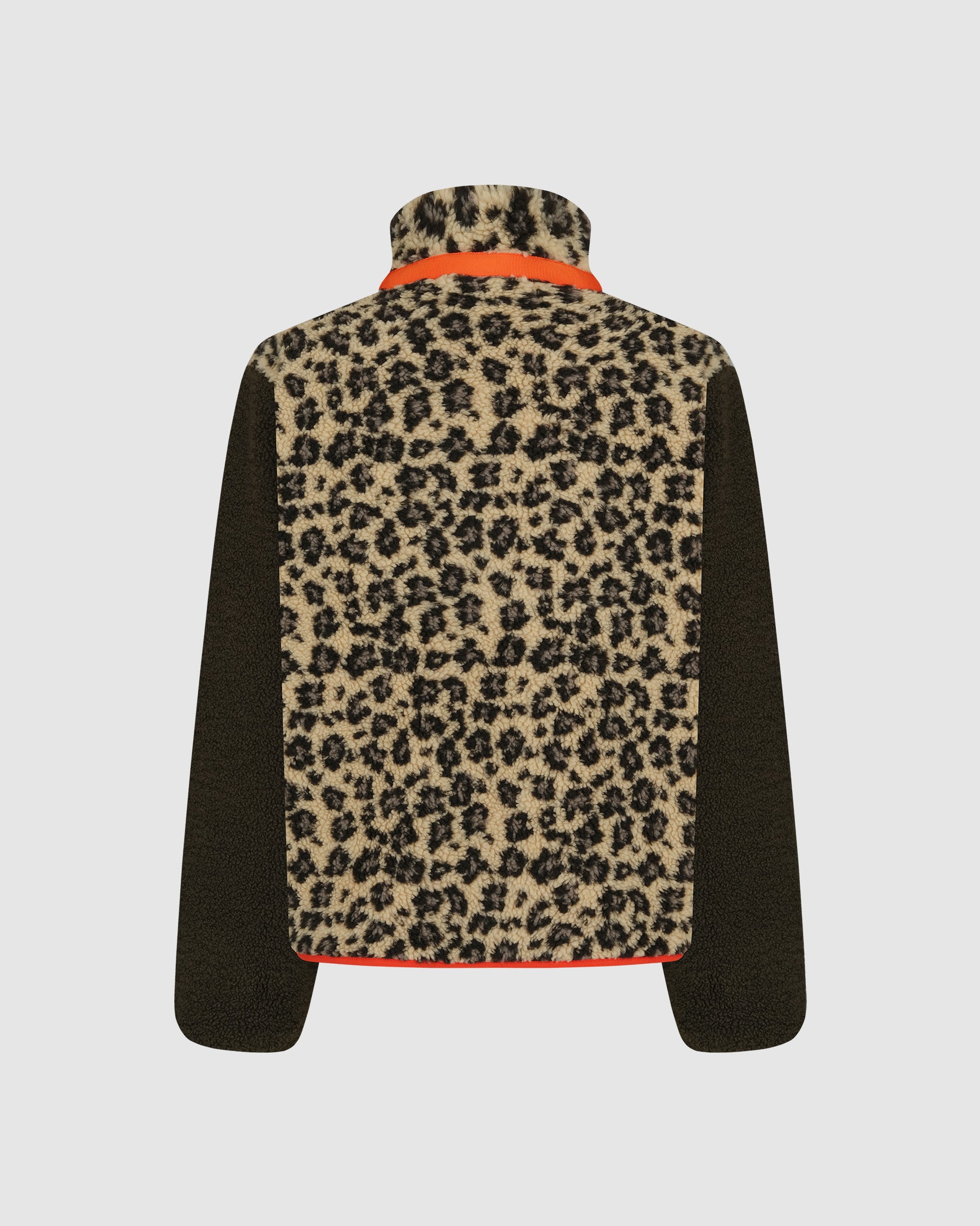 The Tiger Mom Fleece by Sundae School features a sherpa jacket with leopard-print back and collar, black sleeves, and orange hem trim, inspired by the viral Barefoot Jacob style and shown against a white background.