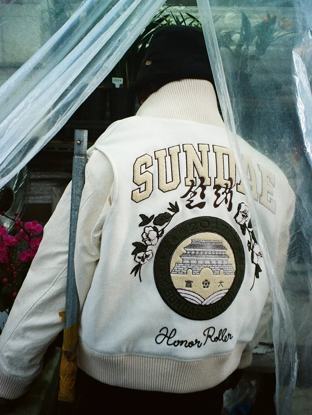 The back of SUNDAE SCHOOL VARSITY JACKET