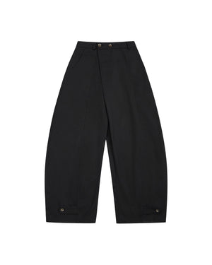 The BLACK HANBOK BALLOON PANTS by Sundae School are crafted from 100% cotton in black. These wide-leg pants are inspired by traditional Hanbok silhouettes and feature front pleats, side pockets, and button closures at the waist and ankle cuffs. Shown here flat on a white background.