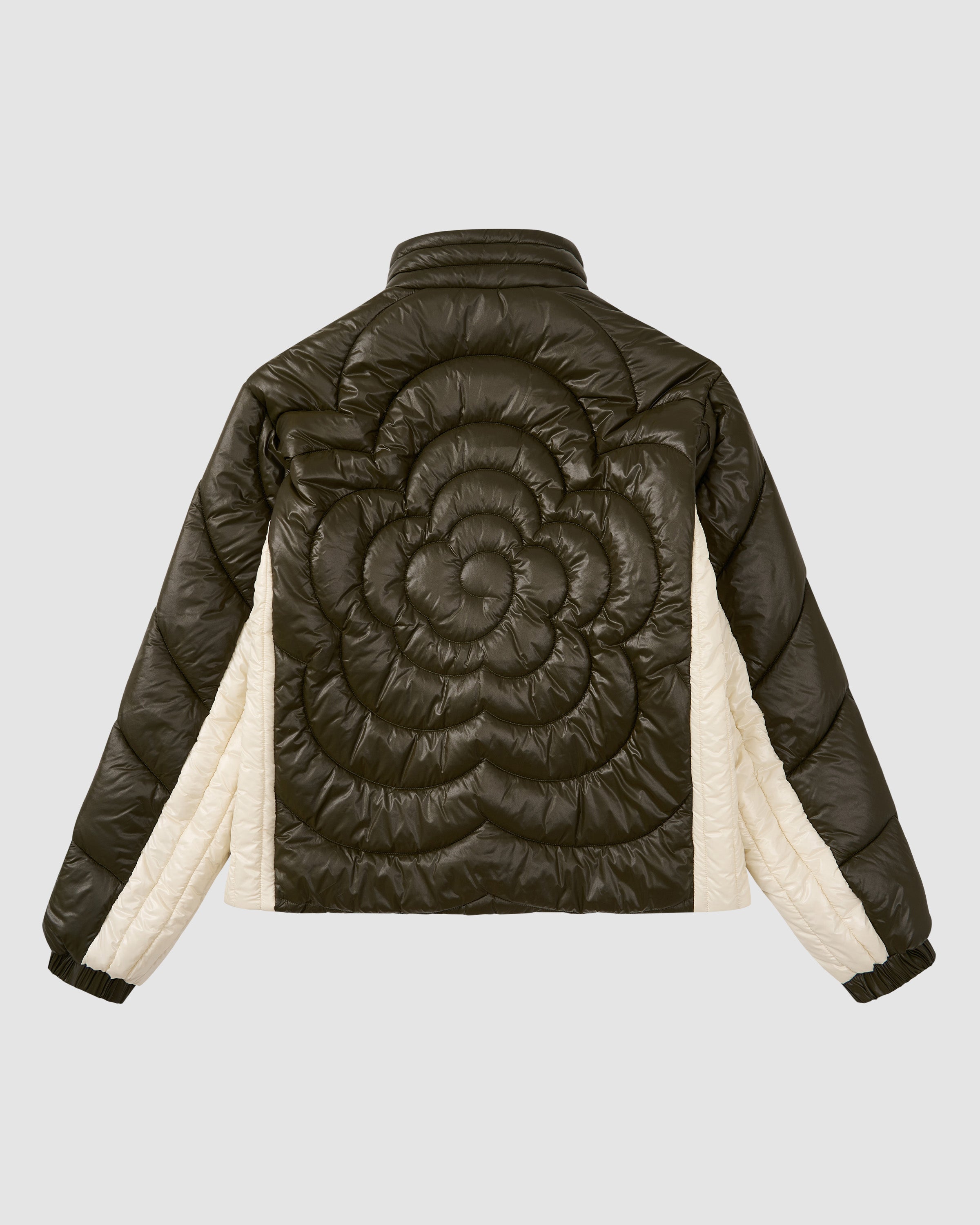 The OLIVE OATMEAL MOCHI SPIRAL PUFFER by Sundae School features a lightweight padded design in dark olive green with quilted flower patterns, ivory white contrast sides and inner sleeves, shown on a light gray background.