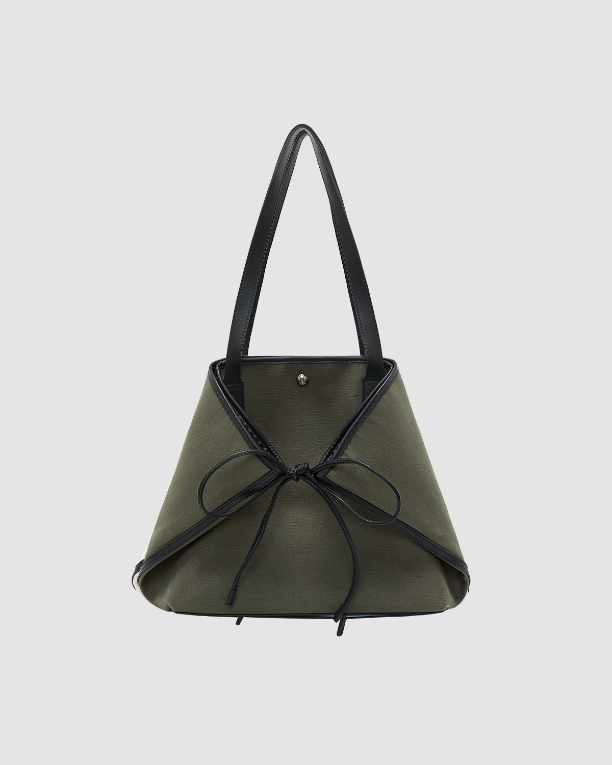 Sundae School's OLIVE BOJAGI TIE TOTE BAG features a trapezoid shape in olive green with vegan leather trim, double handles, and a black bow on the front, displayed against a plain light gray background.