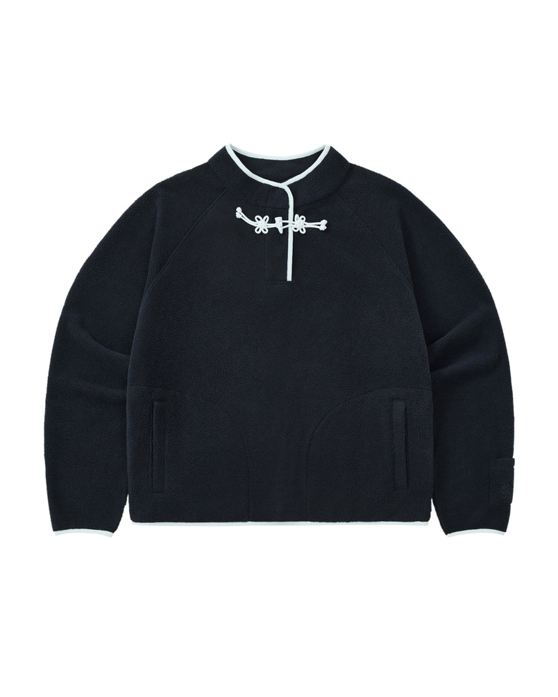 A navy long-sleeve butterfly fleece pullover by Sundae School featuring white trim, a mandarin collar, two front pockets, and decorative flower knot toggles at the neck.