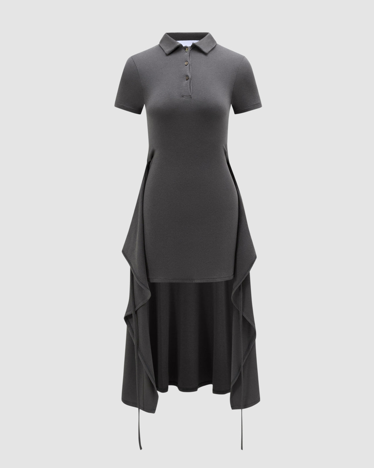 Introducing the DARK GREY CINDY POLO DRESS by Sundae School—a dark gray, short-sleeve convertible apron dress with button details. This unique style features a fitted upper body and draped side panels that extend to a longer hem, creating a layered and structured look. With its modern midi silhouette, the dress offers both polish and effortless versatility.
