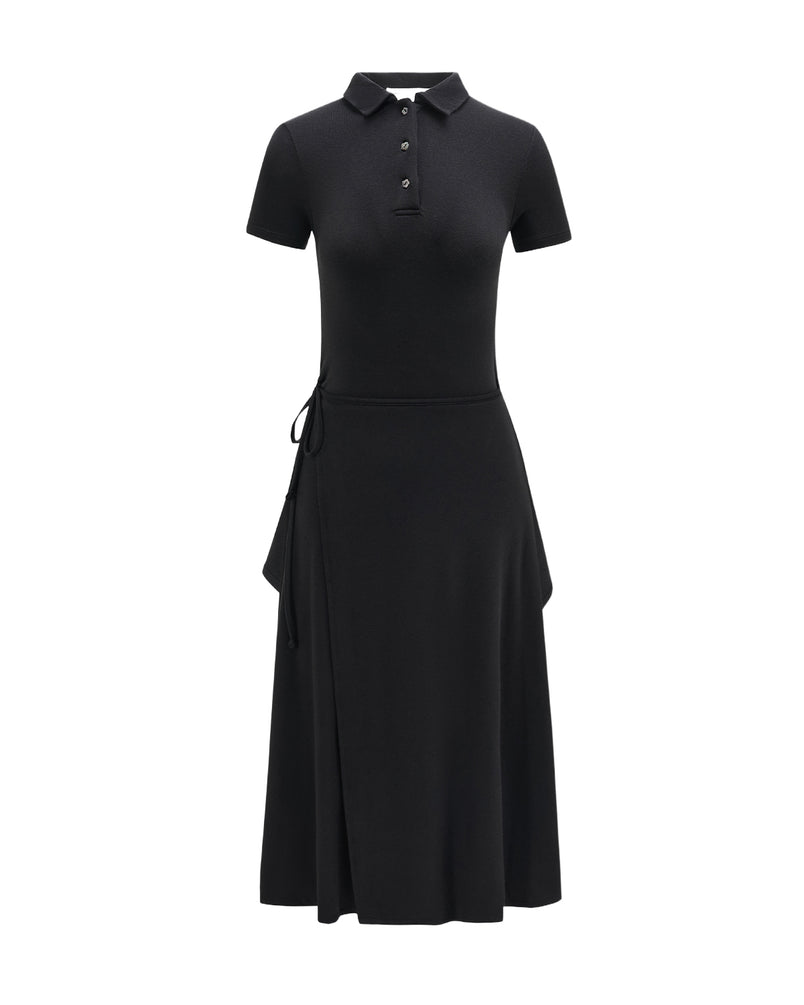 The BLACK CINDY POLO DRESS by Sundae School is a black, short-sleeve, collared midi dress featuring a button-up top and a convertible wrap-style skirt, displayed on a white background.