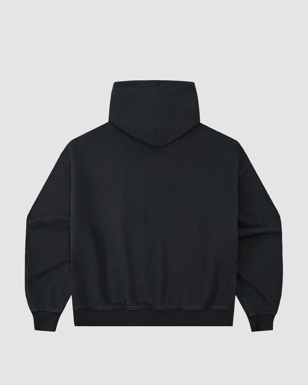 The FADE BLACK COCOON HOODIE by Sundae School features long sleeves, an oversized hood, and a minimalist design with no visible logos, shown from the back against a light gray background—ideal for a cocoon-core look.