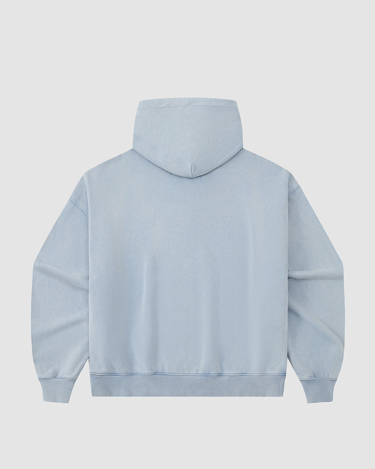 The SKY BLUE COCOON HOODIE by Sundae School is displayed from the back, showcasing an oversized hood, long sleeves, ribbed cuffs and hem, and a minimalist design with no visible logos or graphics.