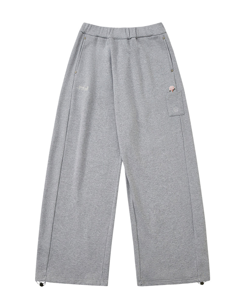 HEATHER GREY WRAP SWEATBAJI by Sundae School: Soft and comfortable heather grey wide-leg sweatpants featuring side pockets, zippered openings near the waist, a small Korean embroidery detail on the right pocket, and adjustable drawstrings at the ankles.