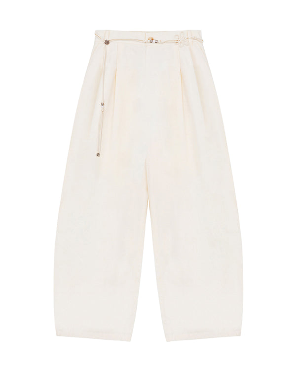 The IVORY FLOWER NORIGAE LINEN TROUSERS by Sundae School are high-waisted, wide-leg cream-colored pants crafted from a cotton-linen blend. Featuring balloon-shaped legs, pleats, an ankle-length cut, and a slim matching norigae belt, these trousers offer a loose, comfortable fit.