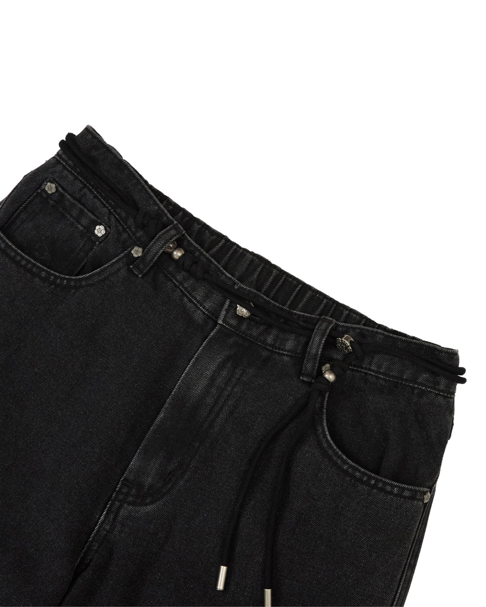 Close-up of the waistband of Sundae School’s BLACK WIDOW FRESHMAN FIT DENIM jeans, featuring an elastic band with a black drawstring, silver grommets, and classic front pockets, shown against a white background.