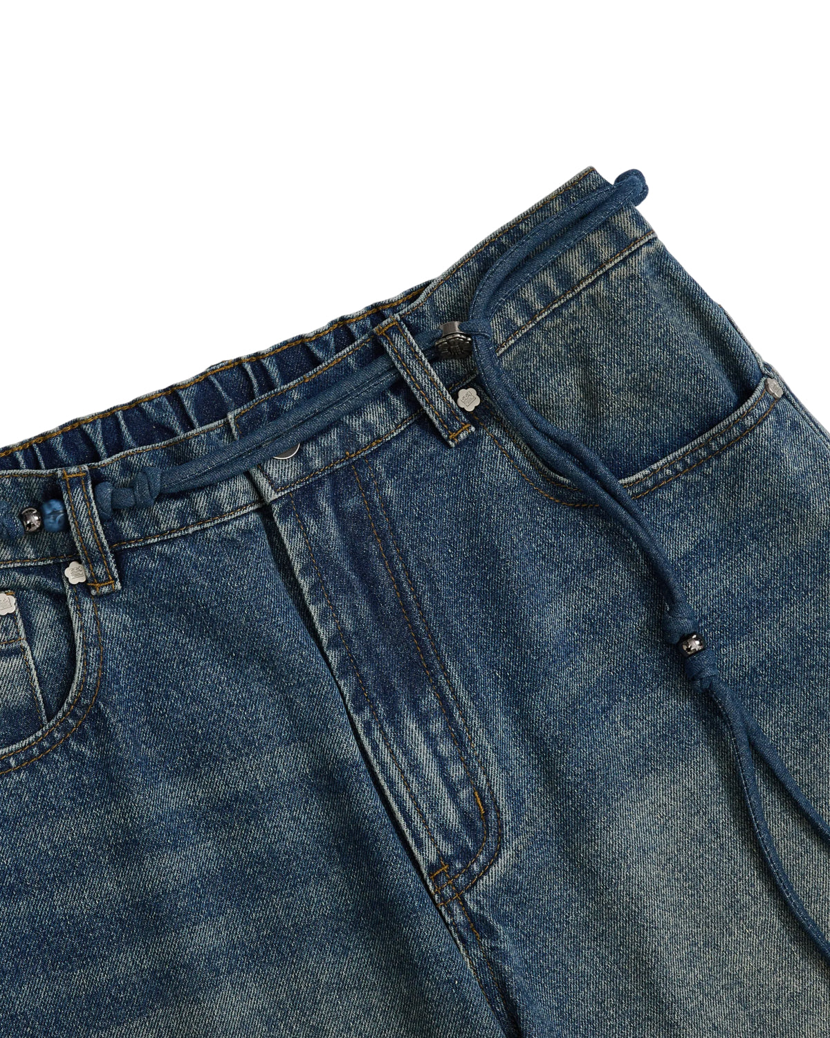 Close-up of the BLUE DREAM FRESHMAN FIT DENIM by Sundae School, featuring a blue Korean denim in a relaxed freshman fit with an elastic waistband and drawstring, side pockets, and visible stitching details.