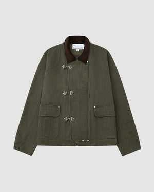 The [PRE-ORDER] OLIVE FIREMAN CLASP JACKET by Sundae School features vintage olive cotton, a dark brown collar, silver clasp closures, two large front pockets, and visible stitching, showcased on a plain light gray background.
