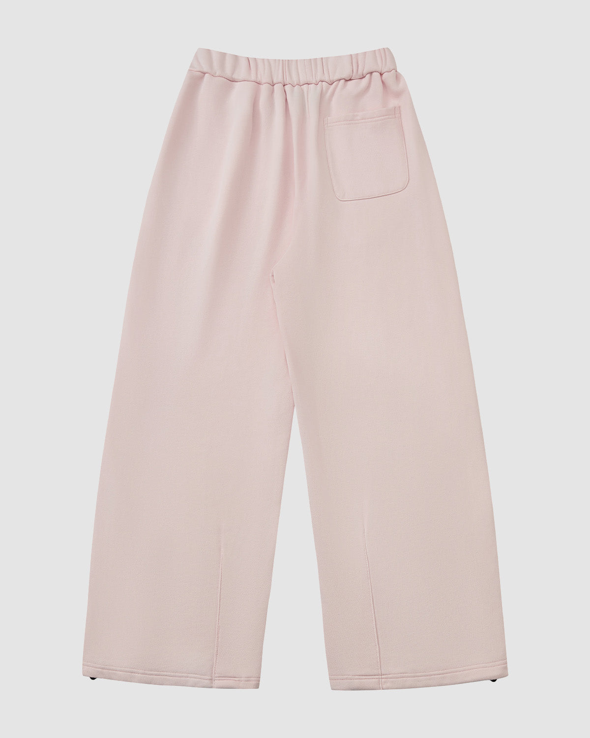 The BABY PINK WRAP SWEATBAJI by Sundae School features a hanbok-inspired wide-leg design, elastic waistband, and single back pocket, shown flat on a white background.
