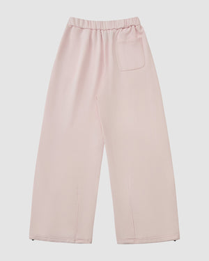 The BABY PINK WRAP SWEATBAJI by Sundae School features a hanbok-inspired wide-leg design, elastic waistband, and single back pocket, shown flat on a white background.