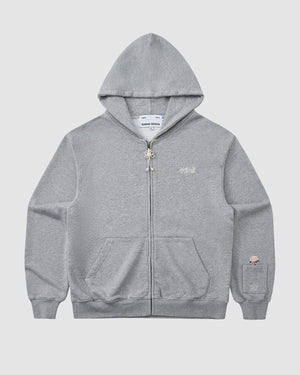 The HEATHER GREY FLOWER KNOT ZIP UP HOODIE by Sundae School is a unisex midweight cotton zip-up with a drawstring hood, front pockets, white chest text, and a Korean embroidery patch on the sleeve, shown flat on a light gray background.