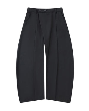 Sundae School’s BLACK PLEATED HANBOK SLACKS are wide-leg, high-waisted black wool pants with double-button closure, pleats, side pockets, and a relaxed fit—modern unisex style shown on a plain light gray background.