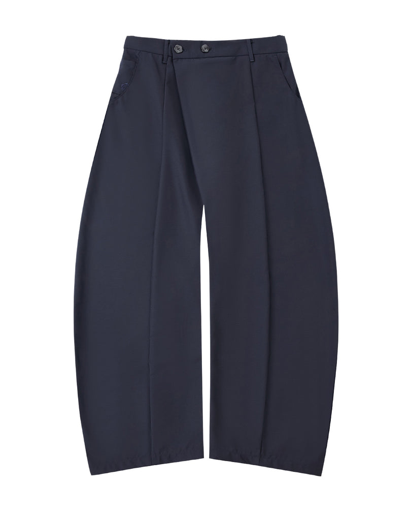 NAVY PLEATED HANBOK SLACKS by Sundae School: high-waisted wide-leg pants in navy wool blend, featuring front pleats, side pockets, and two buttons at the waistband, displayed flat on a white background.