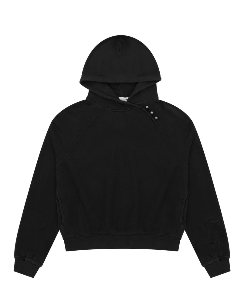 The BLACK WASH HANBOK HOODIE by Sundae School is a black cotton sweatshirt featuring long sleeves, an oversized hood, an asymmetric buttoned neckline, ribbed cuffs and hem, and a small patch detail on the left sleeve.