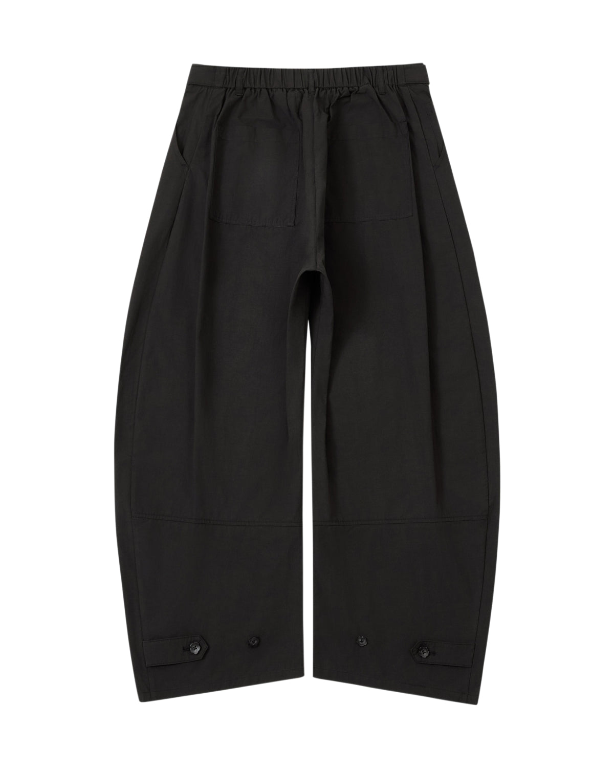 The BLACK HANBOK LINEN PANTS by Sundae School are wide-leg black cotton linen balloon pants with an adjustable waist, prominent front patch pockets, seam detailing, and button accents near the hem. Featuring a wide barrel leg silhouette, the pants are laid flat on a white background.