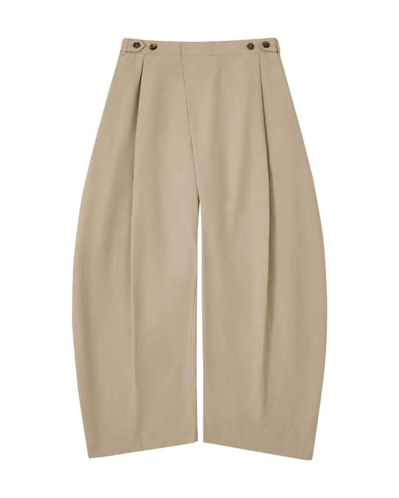 Introducing the WHEAT HANBOK LINEN PANTS by Sundae School—crafted from a comfortable cotton-linen blend, these beige pants feature front pleats, distinctive side button details at the waistband, and an adjustable waist for everyday comfort. Designed with a relaxed, loose fit and a modern wide barrel leg silhouette, they bring effortless versatility to your wardrobe.