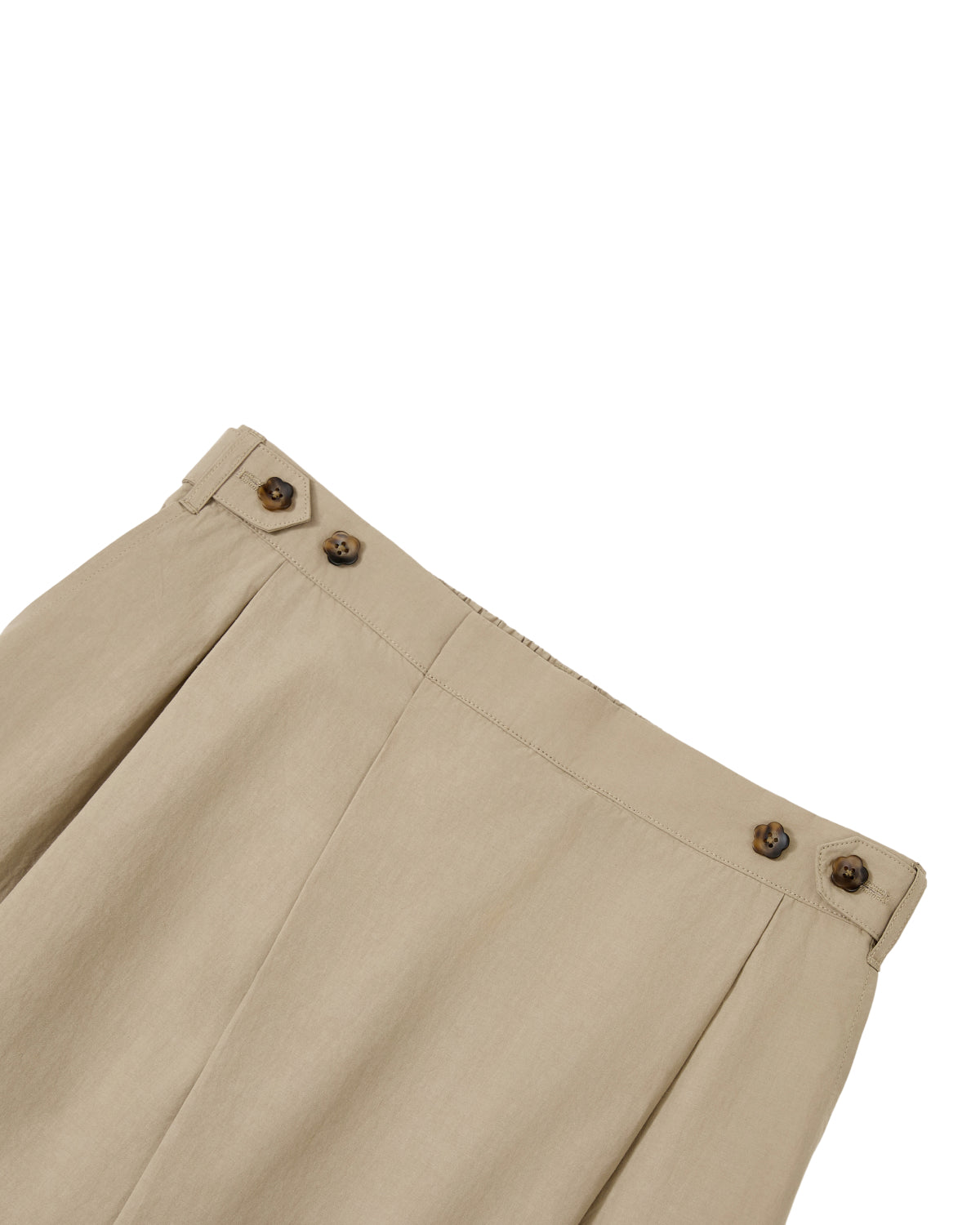 Sundae School’s WHEAT HANBOK LINEN PANTS are khaki-colored balloon pants crafted from a cotton-linen blend, featuring pleats, a high waistband with structured stitching and belt loops, and decorative brown buttons on both sides near the top hem. The adjustable waistband ensures added comfort.