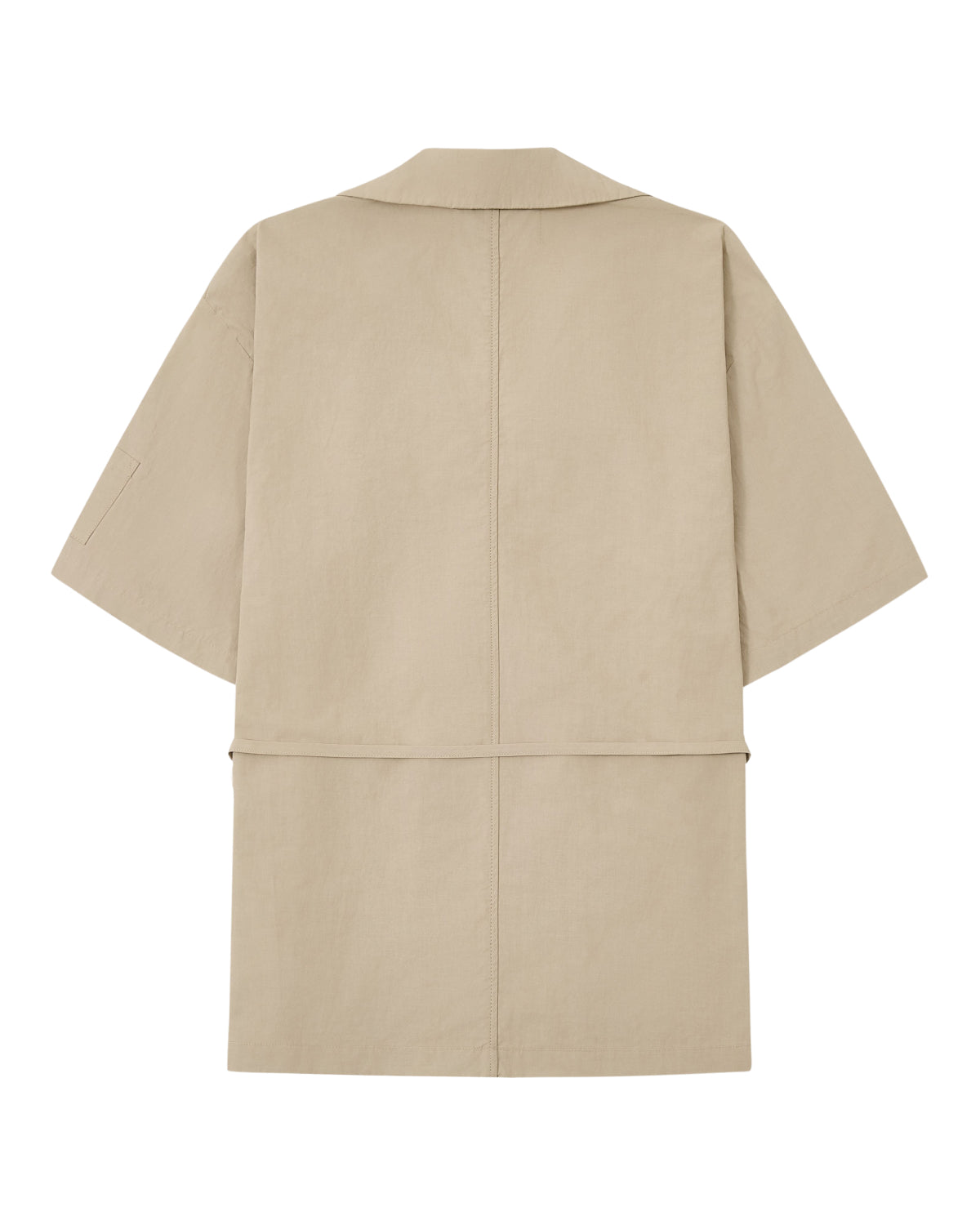 The WHEAT HANBOK LINEN SHIRT by Sundae School is showcased against a white background, featuring a beige hue, short sleeves, and knee-length cut. Crafted from a cotton-linen blend, it’s shown from the back with a simple collar and minimal seams—perfect for layering over your favorite summer shirt.