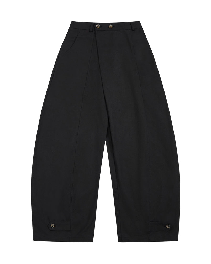 The BLACK HANBOK BALLOON PANTS by Sundae School are crafted from 100% cotton in black. These wide-leg pants are inspired by traditional Hanbok silhouettes and feature front pleats, side pockets, and button closures at the waist and ankle cuffs. Shown here flat on a white background.