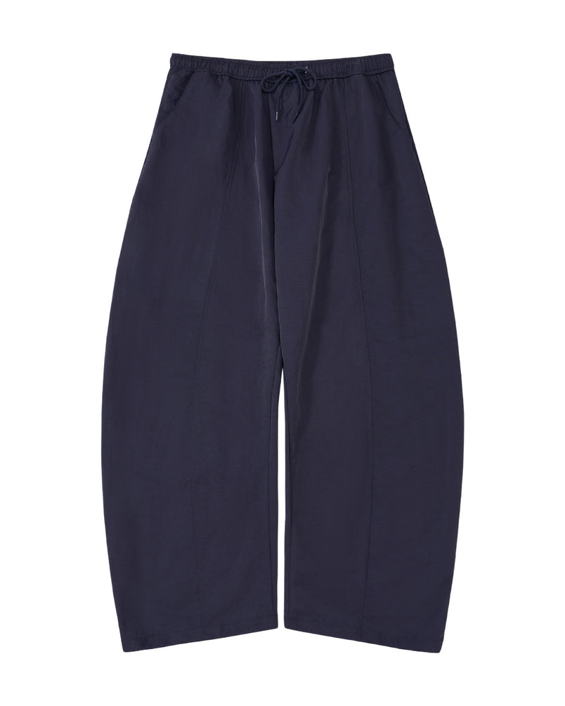 A pair of dark navy wide-leg cropped pants with an elastic drawstring waist, shown flat against a plain white background.
