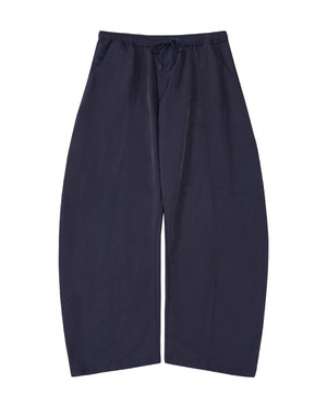 A pair of dark navy wide-leg cropped pants with an elastic drawstring waist, shown flat against a plain white background.