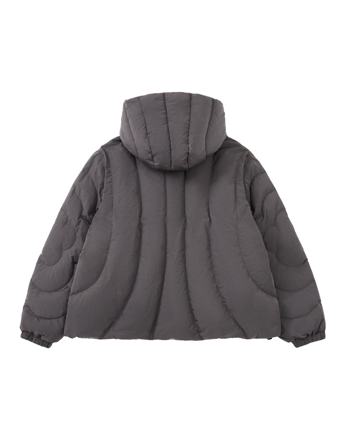 The CHARCOAL HEAVYWEIGHT MOCHI PUFFER by Sundae School is shown from the back, showcasing its curved quilted pattern and elastic sleeve cuffs. Expertly crafted with warm duck down fill, this jacket provides superior insulation.