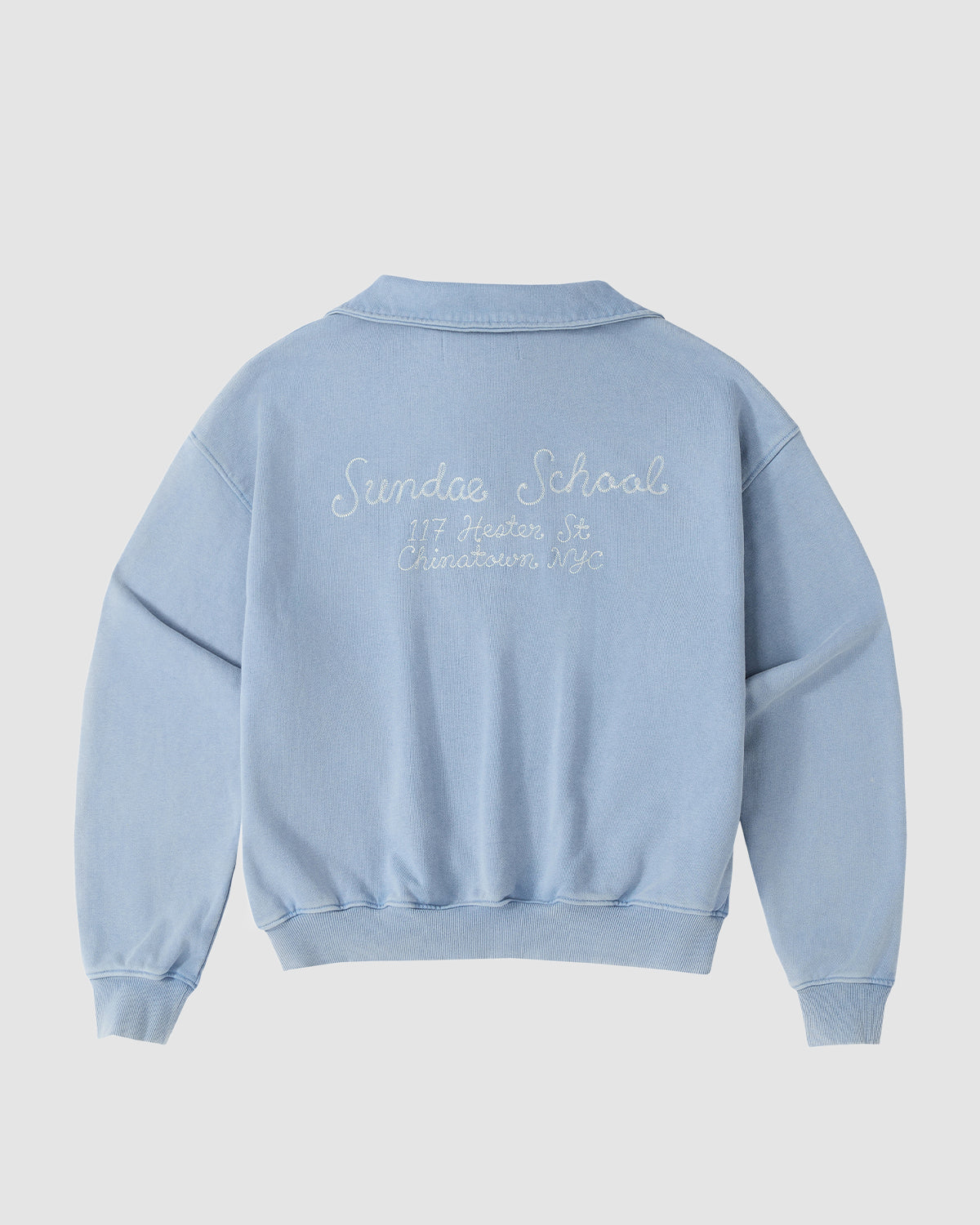 The SKY BLUE HESTER QUARTER ZIP by Sundae School is an oversized light blue sweatshirt with a back view featuring white 