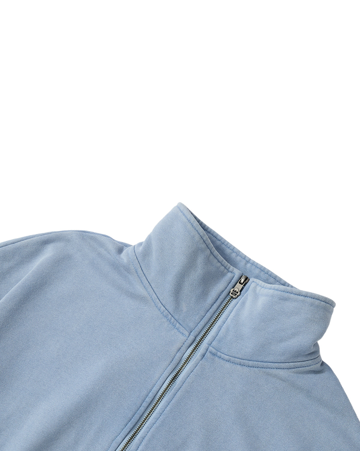 A close-up of the Sundae School SKY BLUE HESTER QUARTER ZIP fleece jacket, featuring a funnel neck collar and a quarter-zip, displayed against a white background.