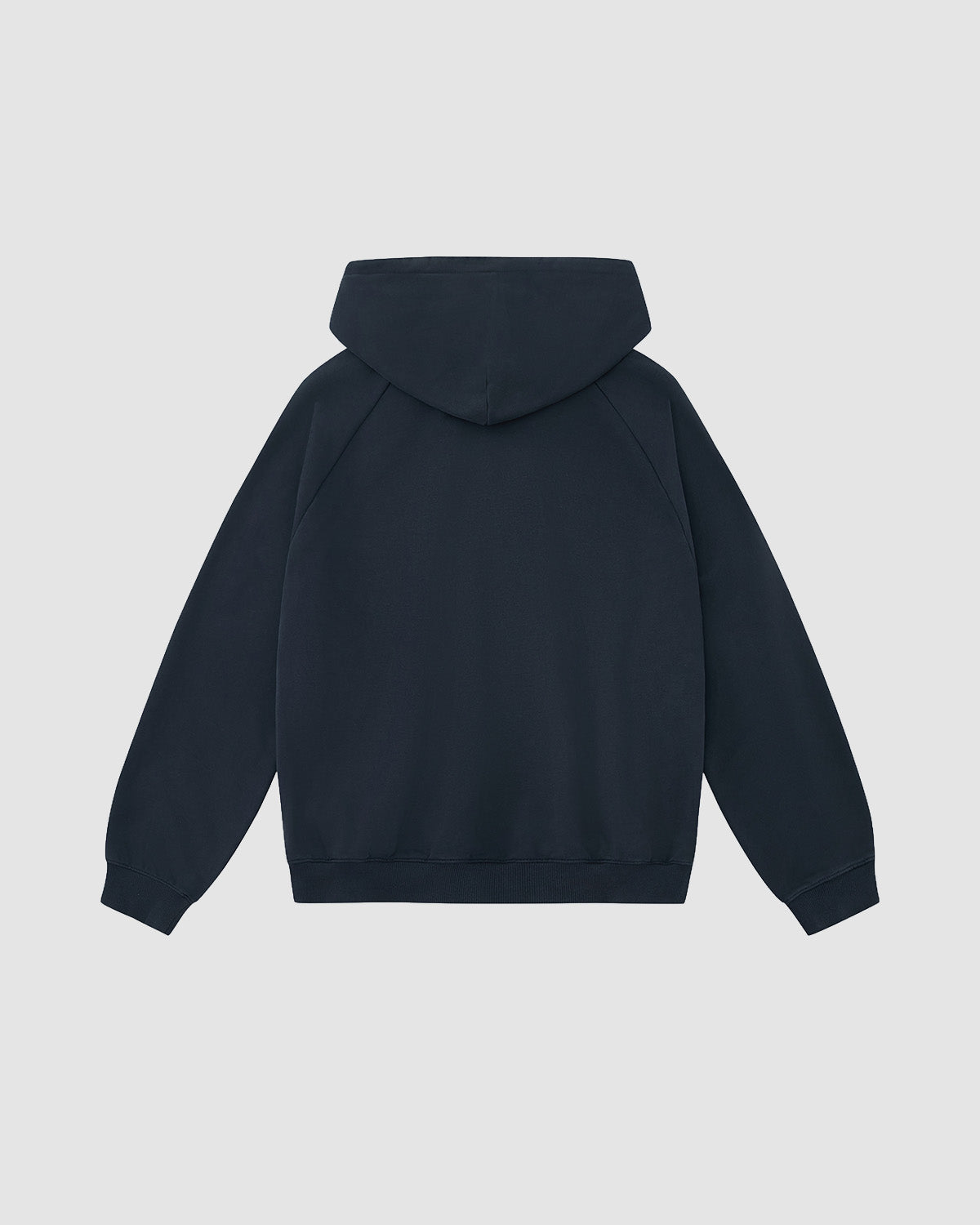 The INDIGO WASH HANBOK HOODIE by Sundae School is shown from the back against a light gray background. This dark navy blue hoodie features long sleeves, ribbed cuffs and waistband, and a signature sleeve stash pocket for convenience.