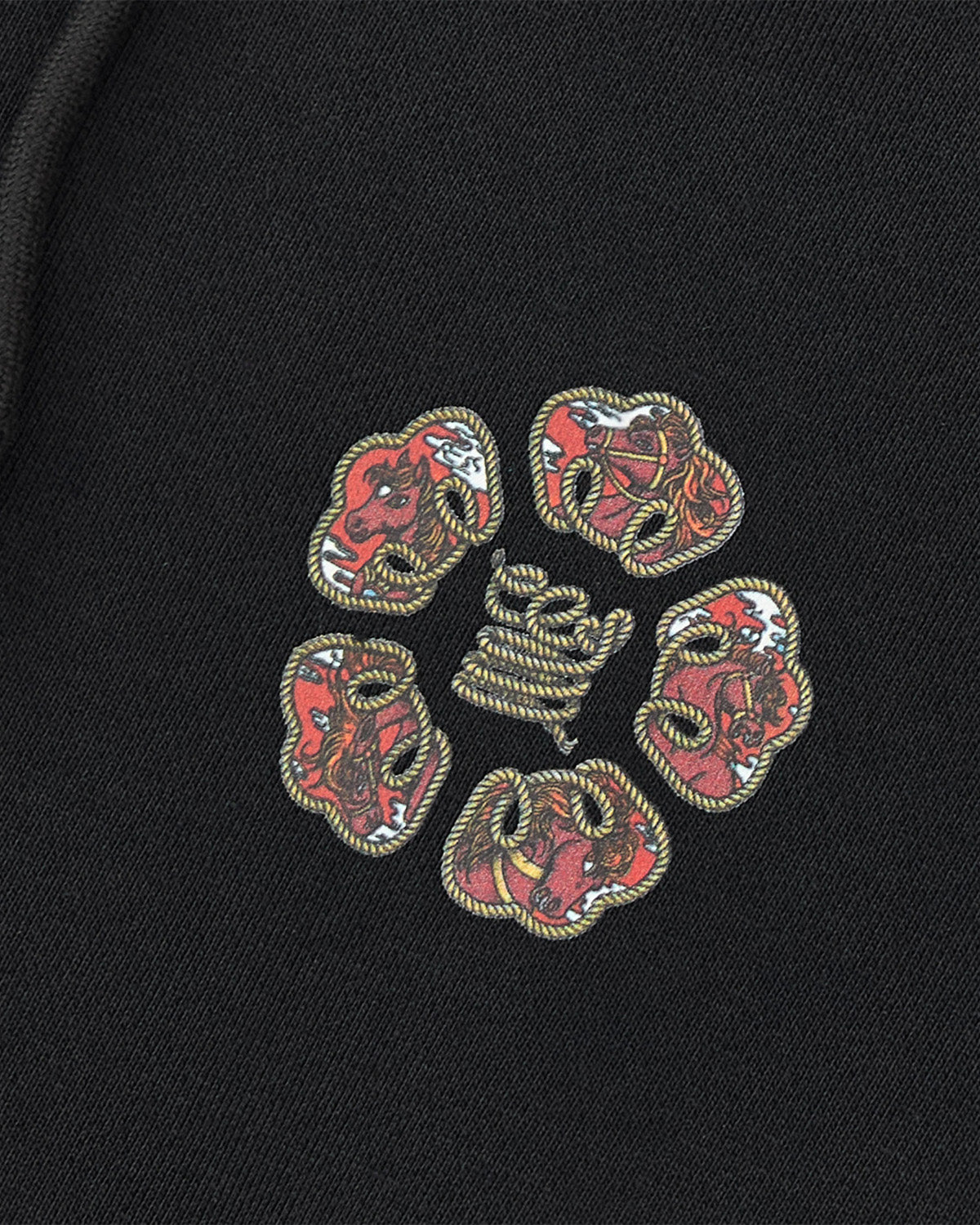 The HIGH HORSE LNY HOODIE by Sundae School features five red bull heads in a circular rope border around a central coiled rope, all printed on a black fabric background.