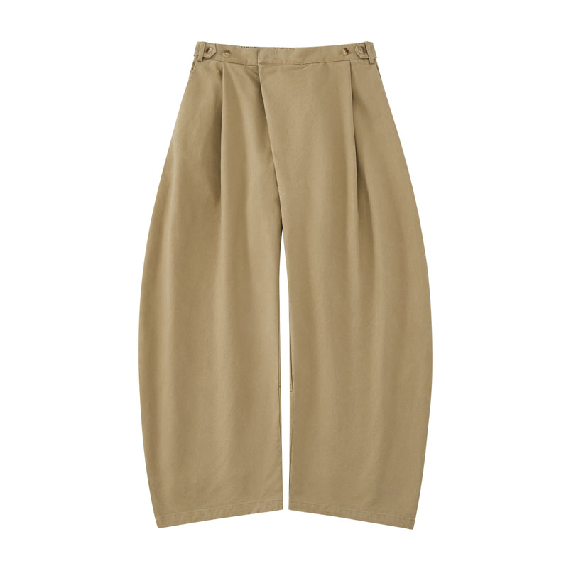 The Tan Hanbok Chino Pants by Sundae School feature a wide-leg, high-waisted barrel-fit chino silhouette with pleats and button details, inspired by classic hanbok styles, shown on a plain white background.
