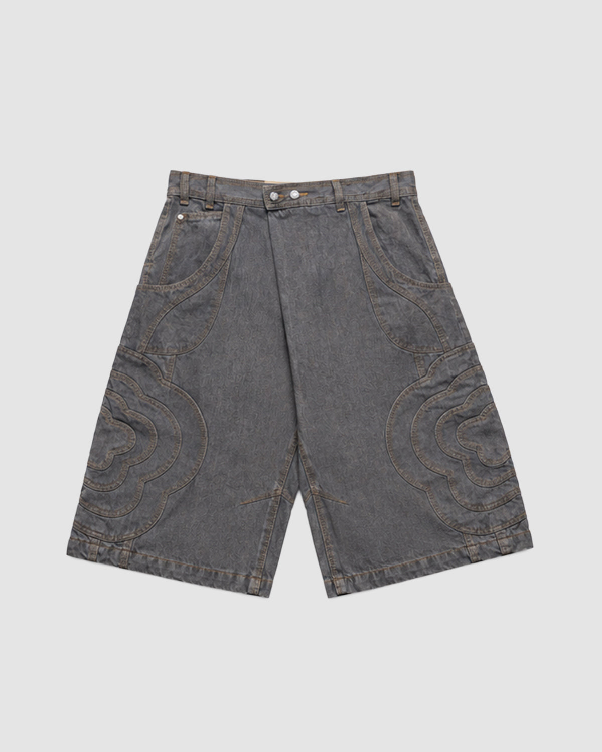 The GREY JORTS JOONIVERSE by Sundae School are wide-leg, knee-length gray denim shorts with front stitched patterns and large side pockets, shown flat on a white background.