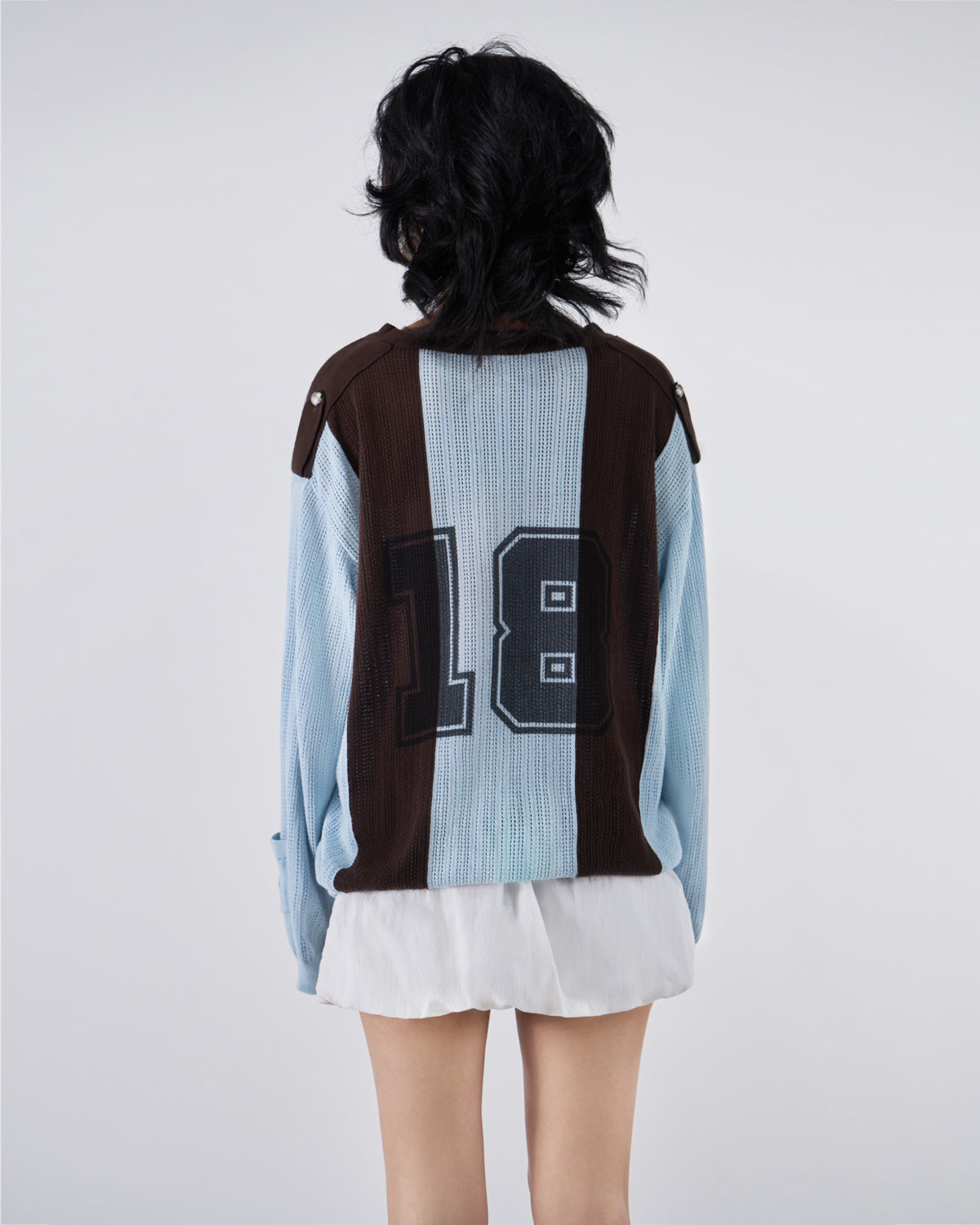 Back view of modeled Baby Blue Brown Sundae Soccer Jersey Knit featuring prominent 