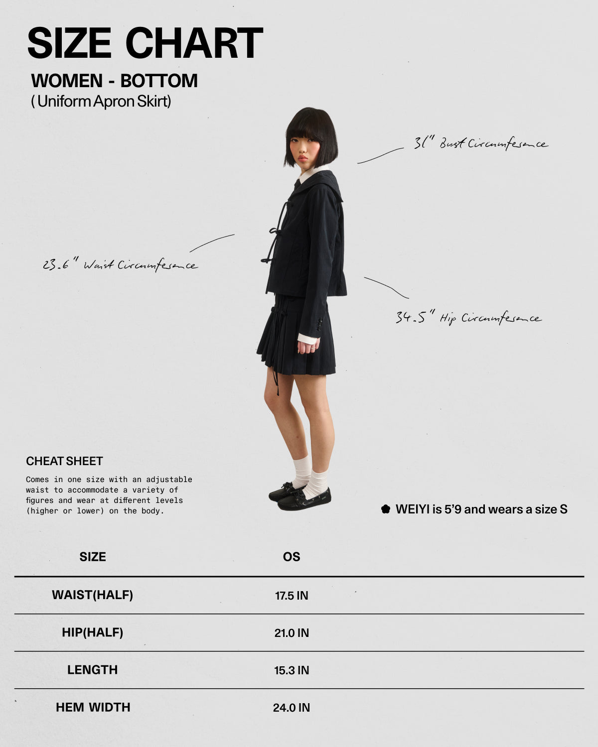 A woman stands sideways wearing Sundae School’s BLACK UNIFORM APRON SKIRT with a cardigan. Size S fits bust 36