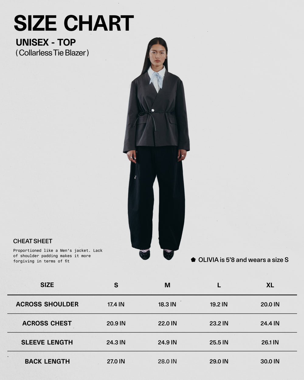 Model OLIVIA (5'8") wears a size S COLLARLESS TIE BLAZER by Sundae School, paired with wide black pants, standing before a blazer size chart showing measurements for sizes S to XL.