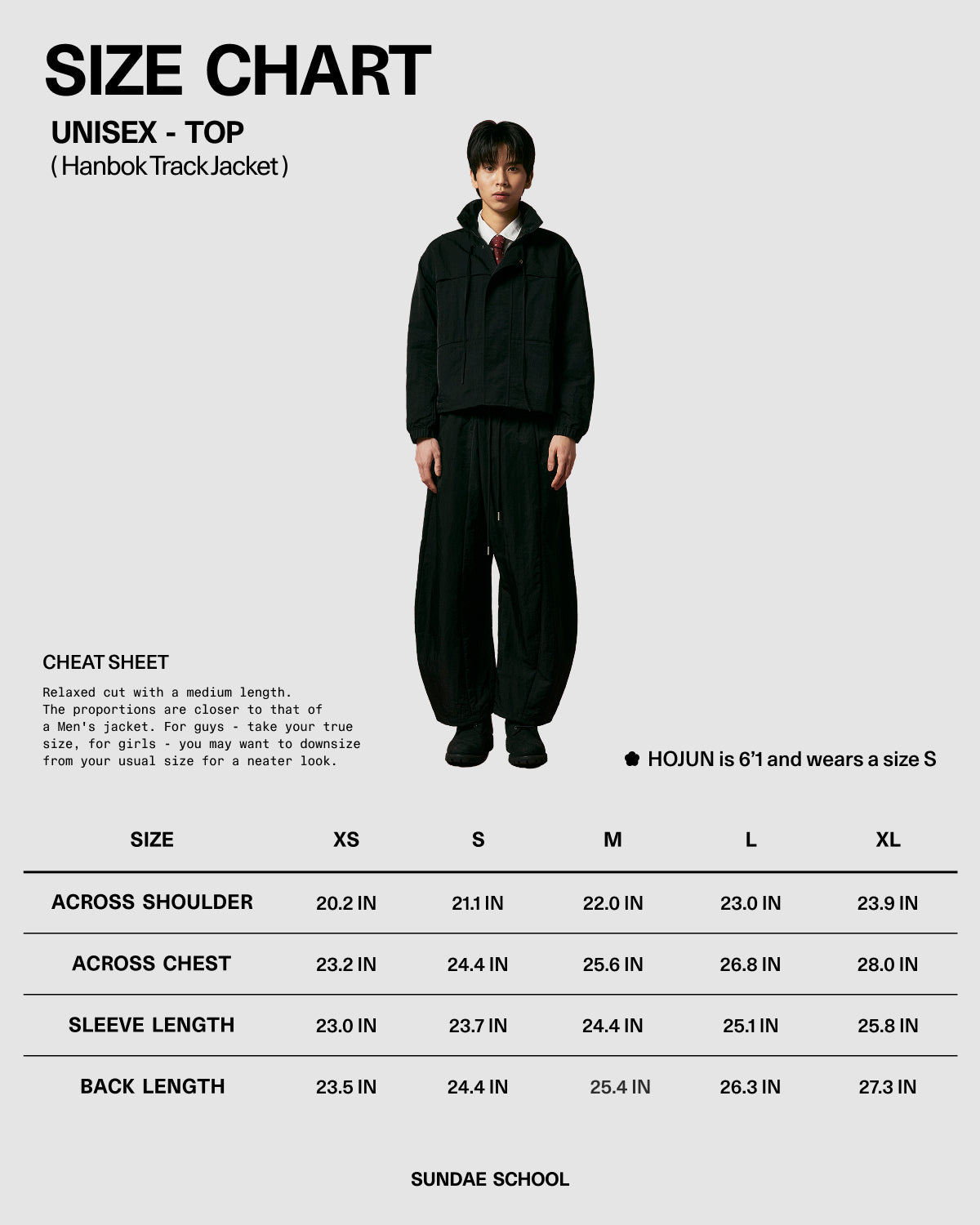 A person stands facing forward wearing the Sundae School NAVY HANBOK TRACK JACKET with wide-leg pants and a custom 떨 zipper pull. Size chart (XS–XL) lists measurements in inches. Model is 6'1
