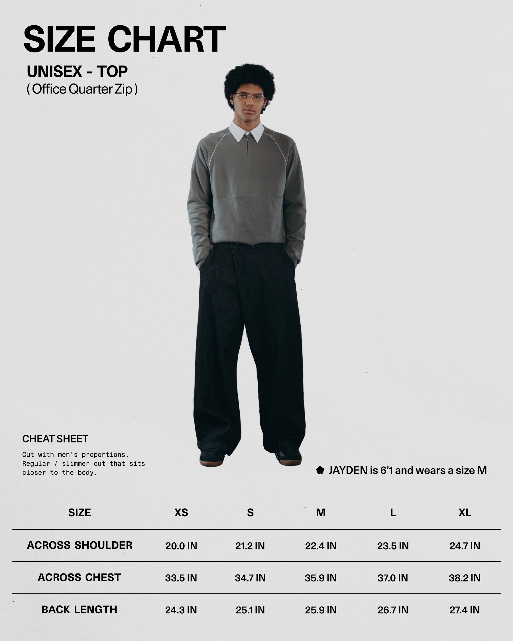 Size chart for a unisex office quarter zip top with a model wearing the garment.
