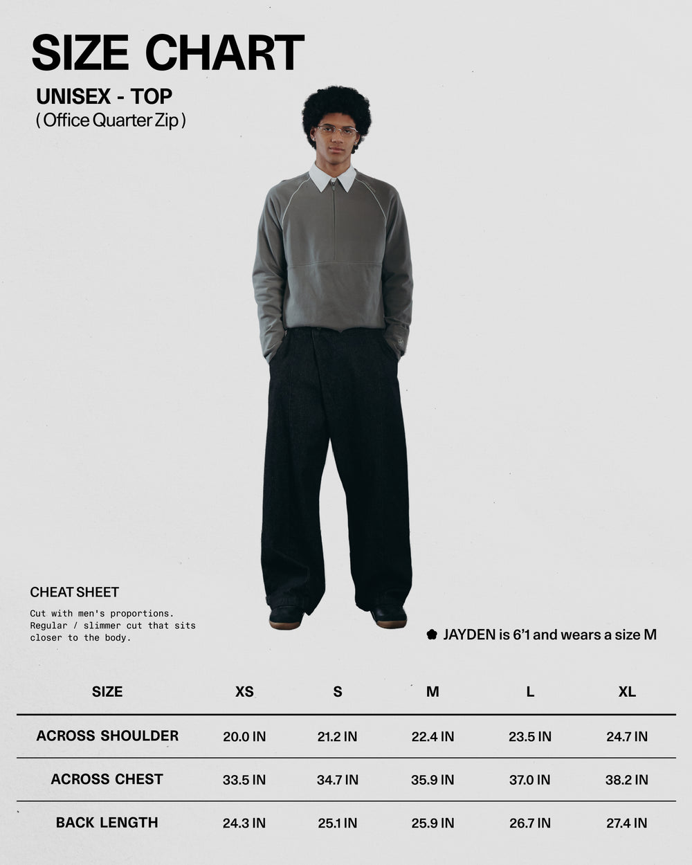 Size chart for a unisex office quarter zip top with a model wearing the garment.