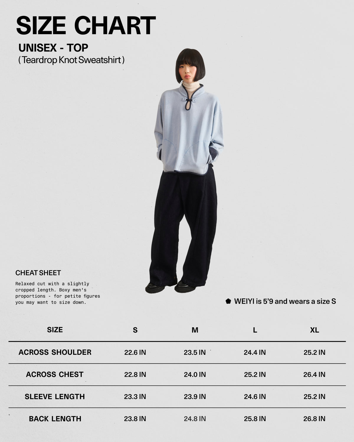 A person stands in the center wearing the Sundae School SKY BLUE TEARDROP KNOT SWEATSHIRT, which features denim trim and is paired with black pants. Below are size chart measurements for unisex tops made from 100% cotton, available in sizes S, M, L, XL, and 2XL. Model height and sizing details are also listed.