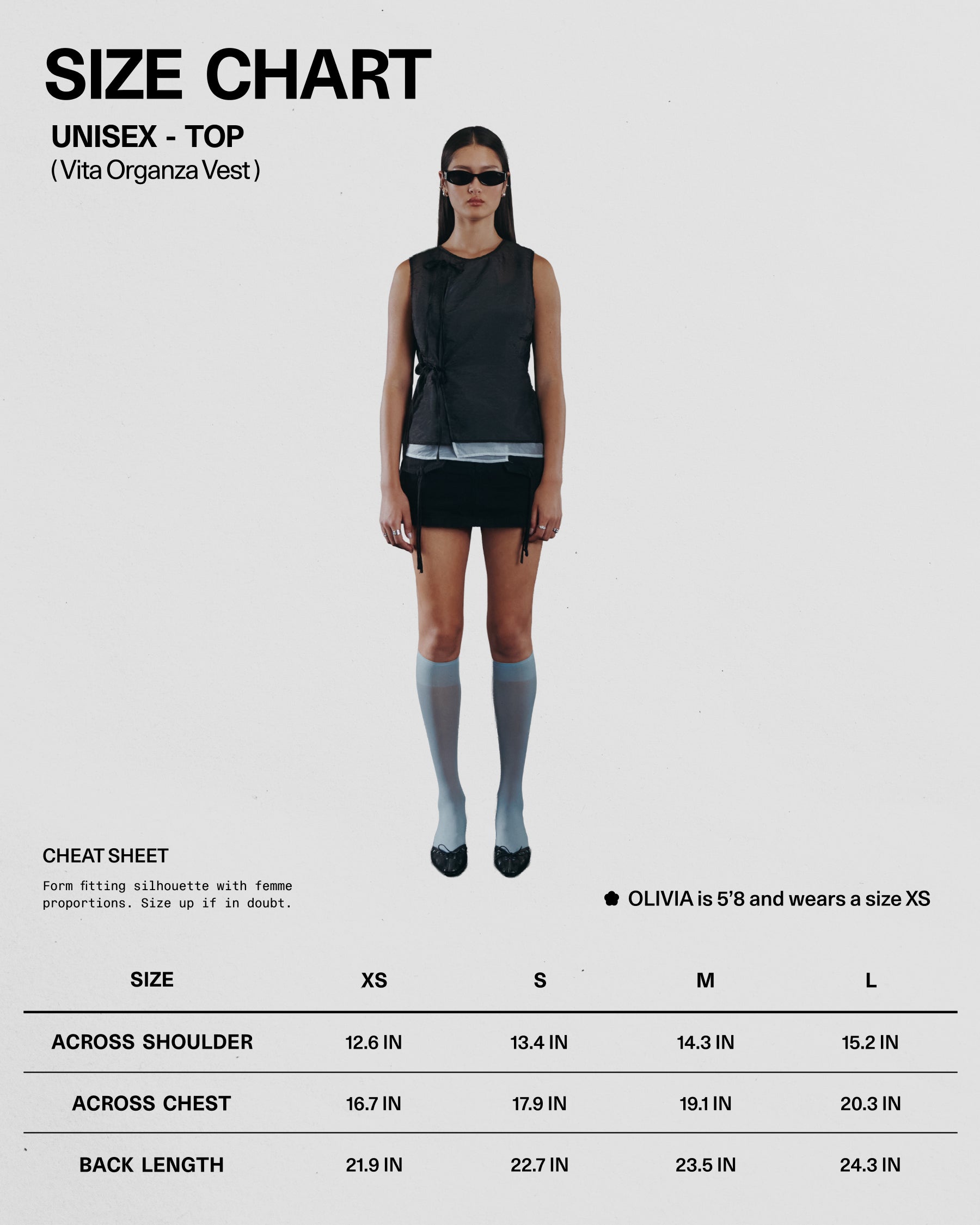 Size chart for a unisex top with a model wearing the garment.