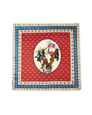 Experience the narrative artistry of the MINHWA BANDANA by Sundae School. Crafted from silk, this Korean folk art scarf features a vivid red background accented with an ornate blue and cream border, while its oval center portrays two women in traditional attire beneath a tree. Delicate bird motifs are scattered throughout, making this luxury accessory an ideal gift to elevate any collection.