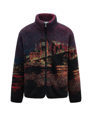 Introducing the New Toker Fleece by Sundae School—a sherpa fleece zip-up jacket crafted with a striking NYC cityscape jacquard in red, yellow, and black hues, reminiscent of an impressionist masterpiece across the front.