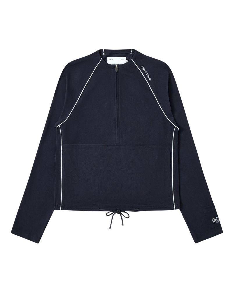 Introducing the NAVY OFFICE QUARTER ZIP by Sundae School—a navy blue long-sleeve pullover made from soft cotton jersey, highlighted by white piping accents, a convenient quarter-zip collar, adjustable drawstring hem, and a handy stash pocket. Subtle Sundae School logo details adorn the chest and sleeve for an understated yet refined finish.