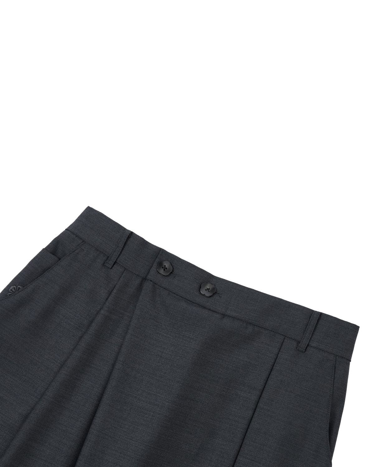 A close-up of the waistband and upper section of Sundae School’s CHARCOAL PLEATED HANBOK SLACKS, showcasing two black buttons and belt loops against a white background.