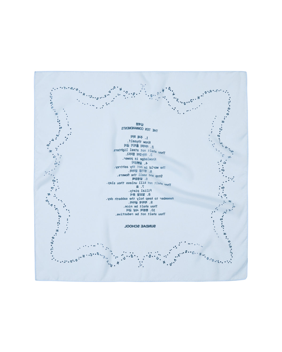 A SKY BLUE 10 COMMANDMENTS ORGANZA BANDANA by Sundae School, featuring a light blue sheer organza fabric with a dotted border and reversed blue text printed at the center, displayed on a white background.