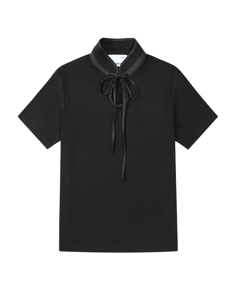 The BLACK RIBBON TIE POLO by Sundae School is a short-sleeve polo featuring a high Manchurian teardrop collar and a black ribbon tied in a bow at the neck, shown laid flat on a white background.
